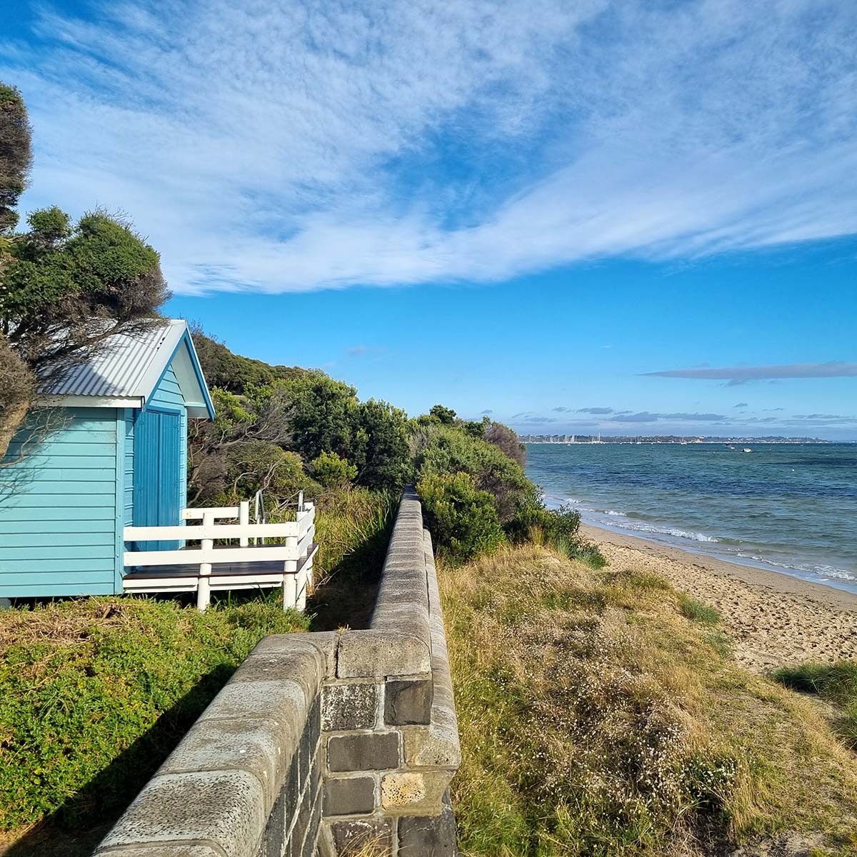 Description: Photo of a vacant residential block with temporary fence erected at the footpath. AS Planning are Town Planners in Victoria.