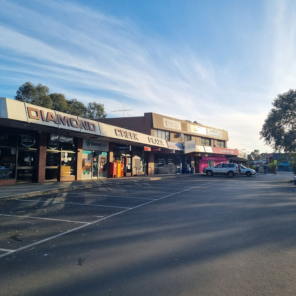 Description: Photo of a vacant residential block with temporary fence erected at the footpath. AS Planning are Town Planners in Victoria.