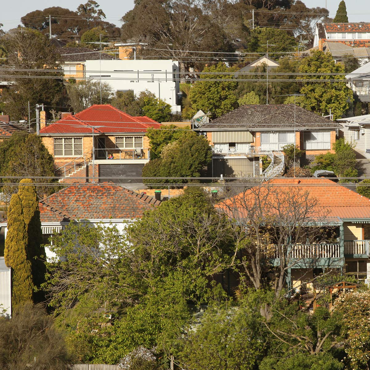 Description: Photo of a vacant residential block with temporary fence erected at the footpath. AS Planning are Town Planners in Victoria.